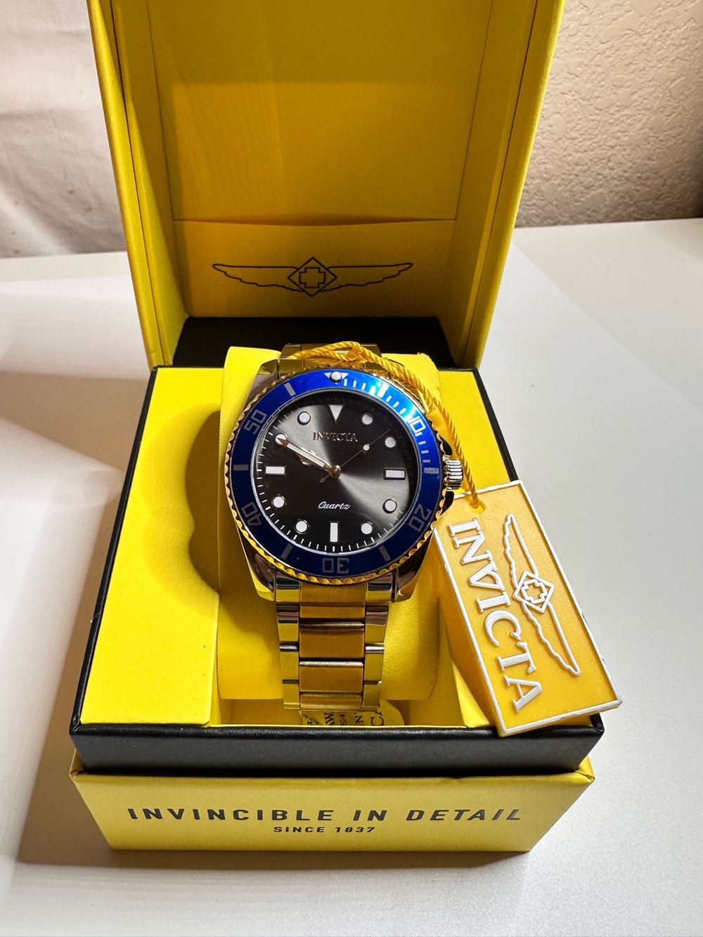 Invicta Men's Silver Stainless Steel Watch with Blue Bezel